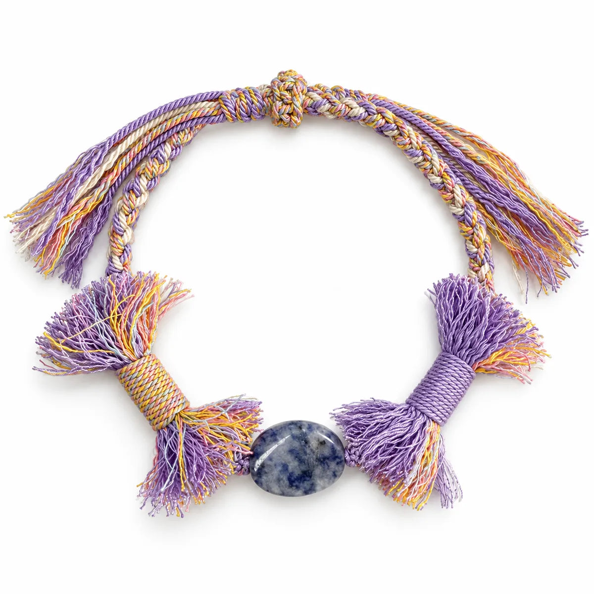 Crystals for mental clarity bracelet with an oval white and blue sodalite stone on lavender braided cord with full tassels