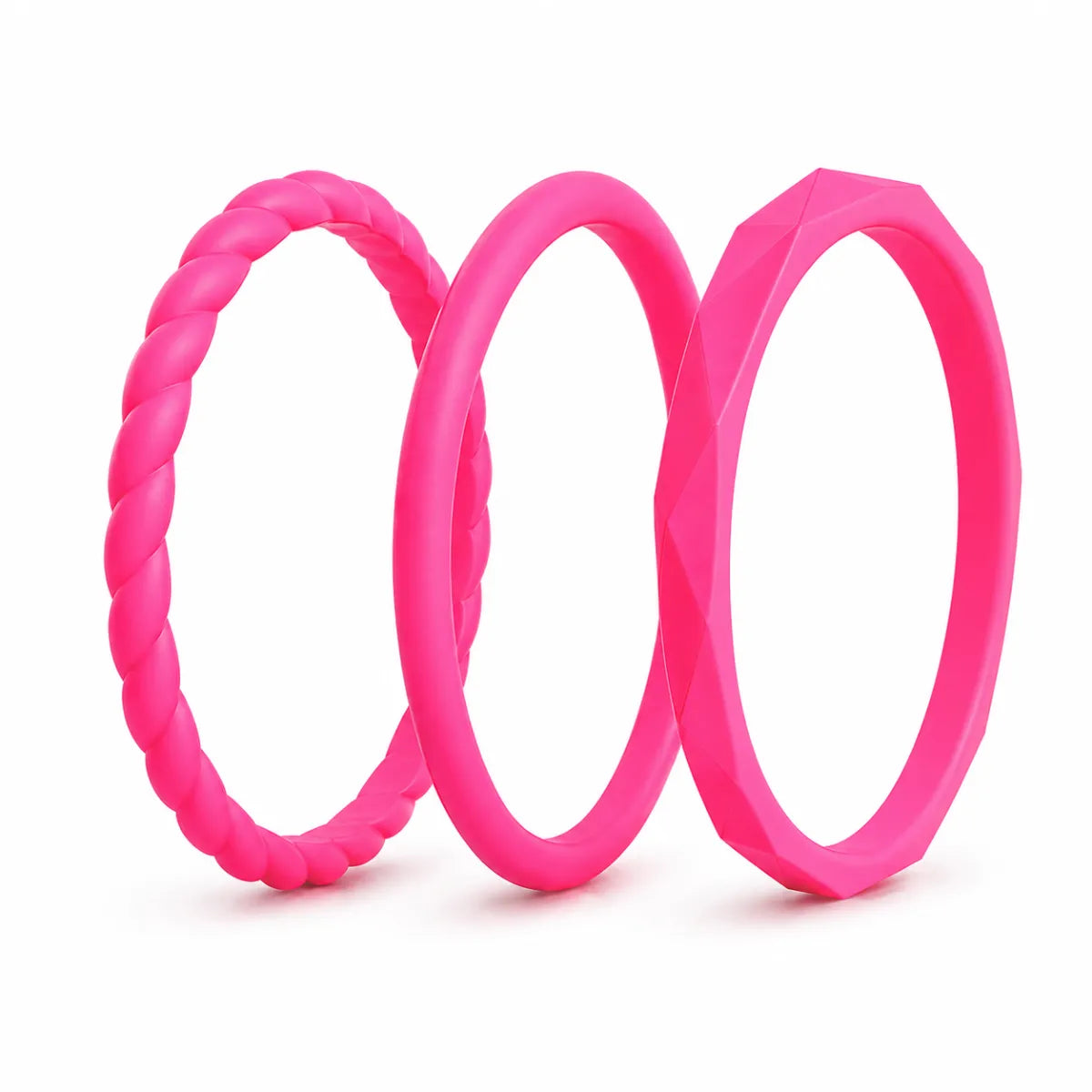 Norelva Blush Pink stackable silicone rings for women, 3-pack wedding band set on white background